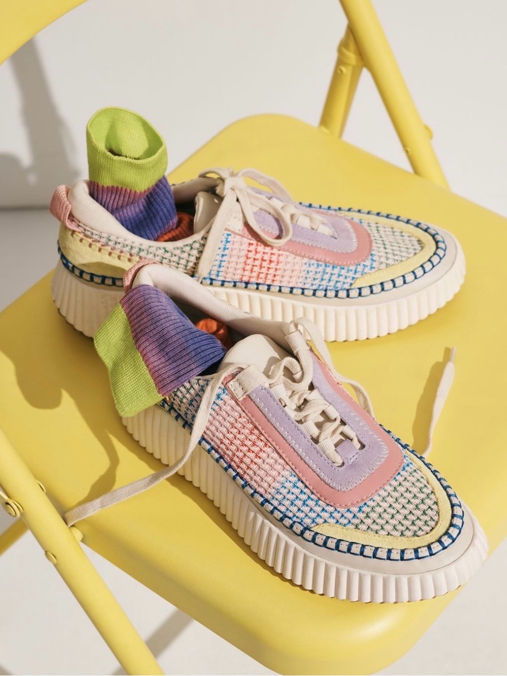 Dolce Vita Dolen sneakers featuring a vibrant, multi-colored woven knit pattern